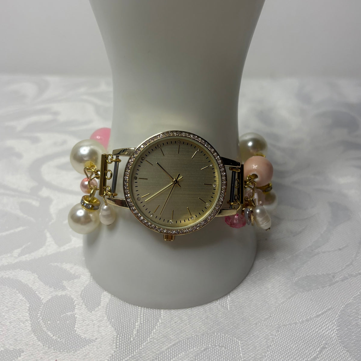 pink lady working beaded watch bracelet
