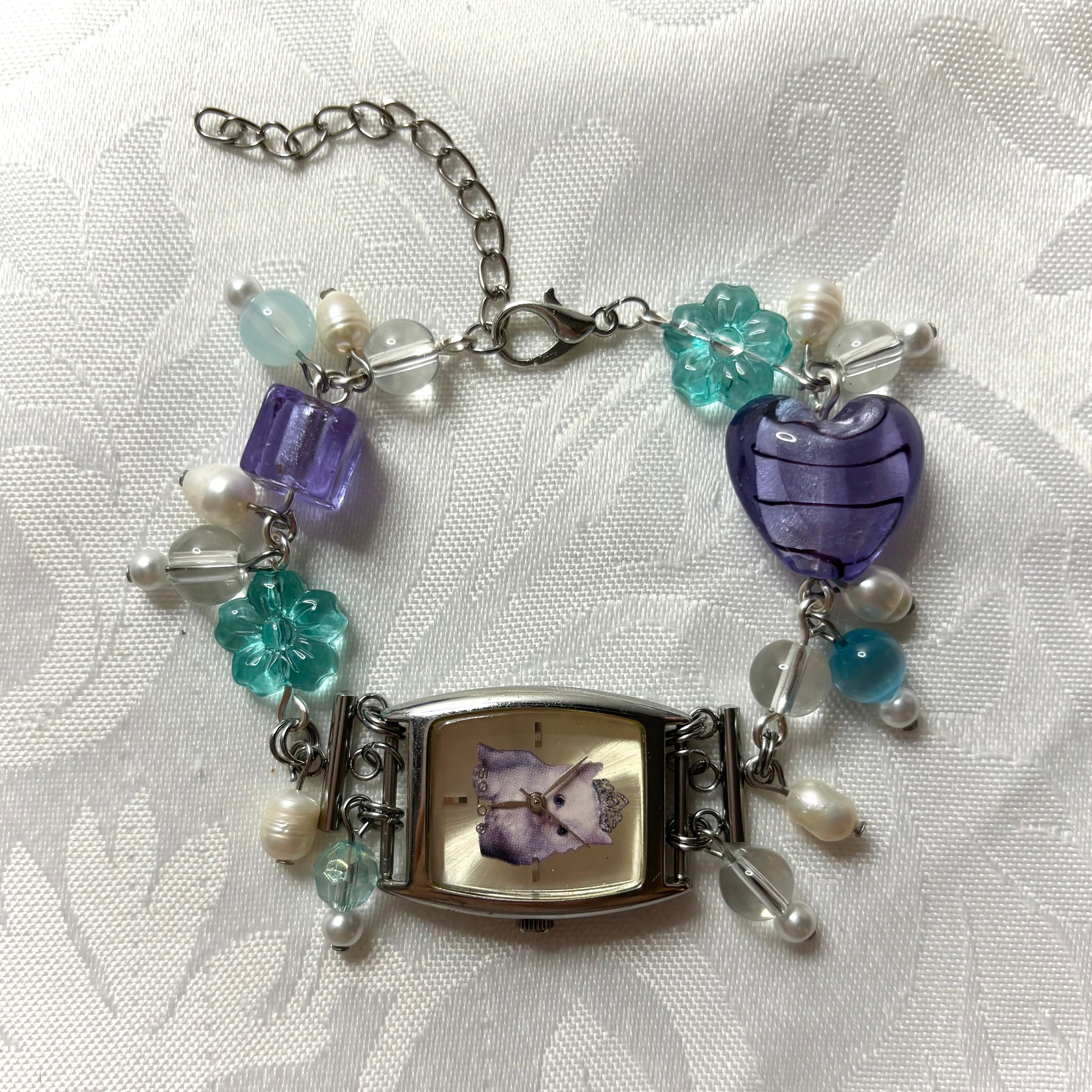 princess kitty working beaded watch bracelet