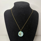 dolly pendant necklace