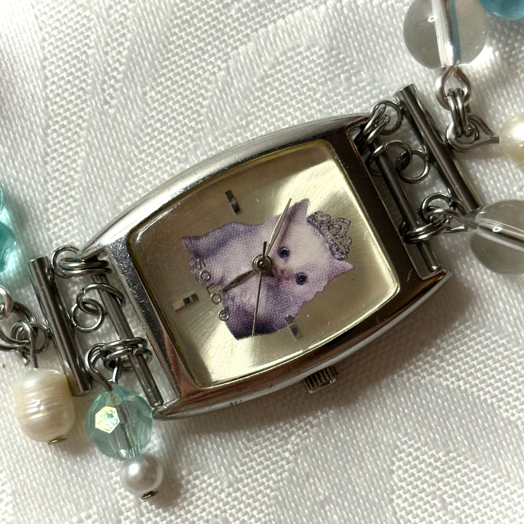 princess kitty working beaded watch bracelet