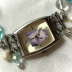 princess kitty working beaded watch bracelet
