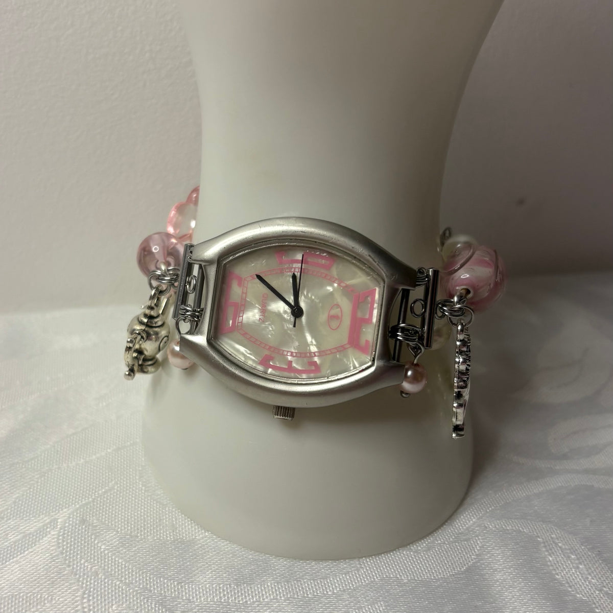 pink castle working watch bracelet
