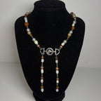 16 carriages beaded necklace